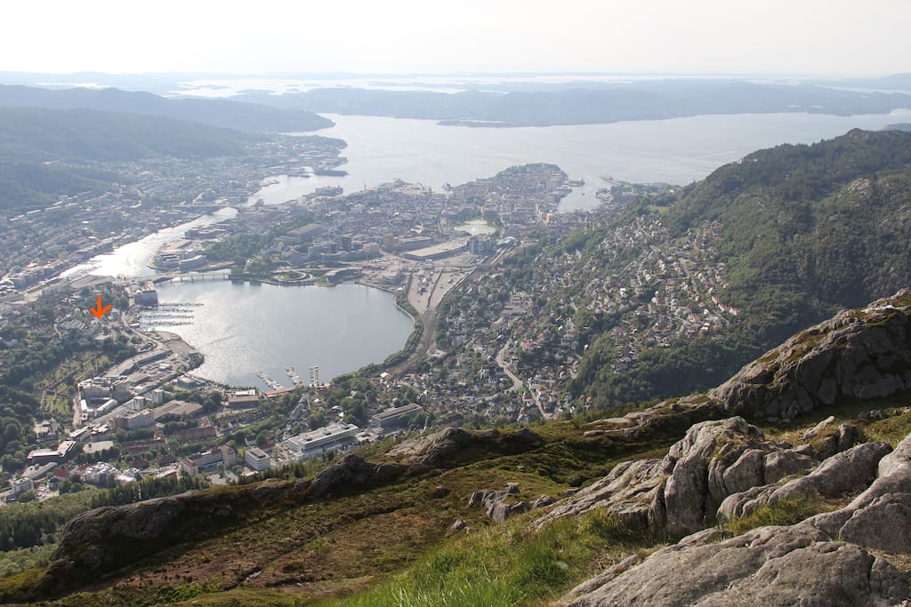 The centre of Bergen seen from Mount Ulriken. The Apartment being marked by an Arrow to the left in the picture