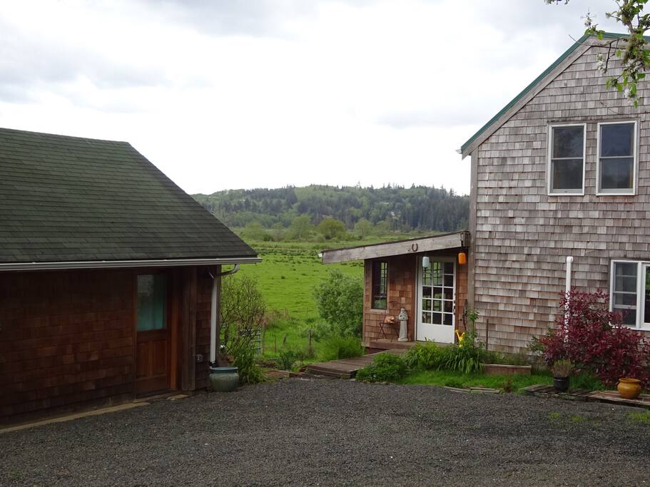 Studio to left, main house to right