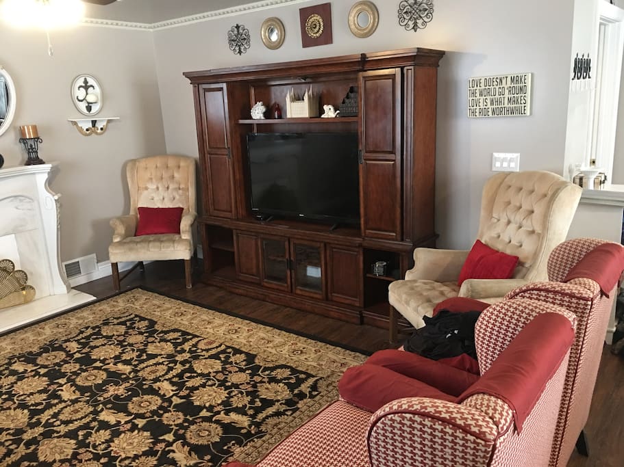 Living Room with TV and Entertainment Center. 50” LCD 1080p TV with HD antenna for local television channels and Apple TV for streaming. DirecTV Now streaming is provided. Other services use your own accounts