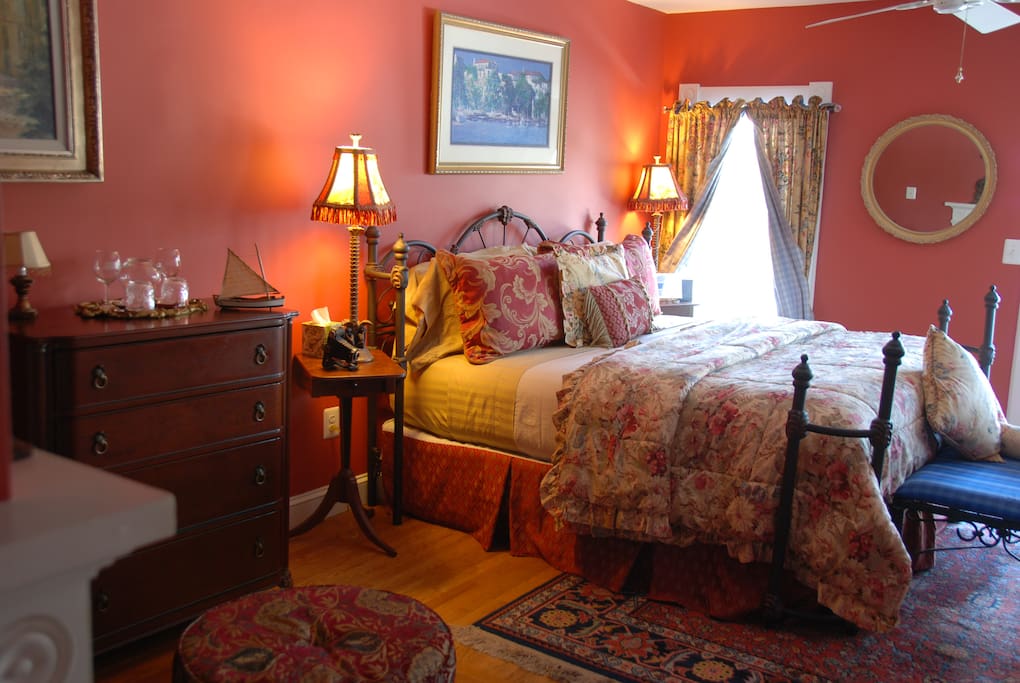 Room 1: King Bed, French doors opening to private deck