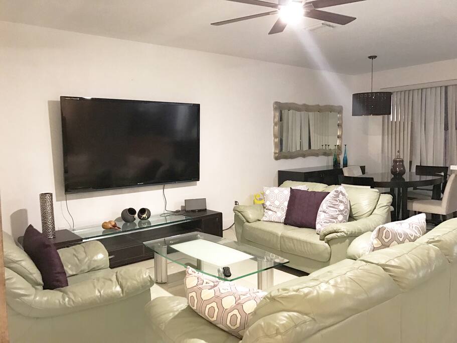 Living Room Area (ceiling fan & 80'inch tv)