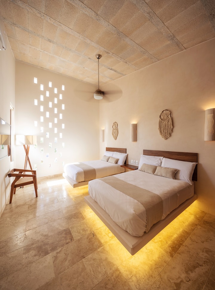 Bedroom # 2 :
2 double double beds
We attach great importance to the lighting of our apartment (all lights are indirect) and you will be very comfortable. Our rooms are equipped with usb plugs, perfect if you forgot your charger.