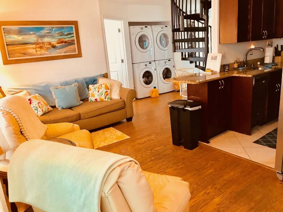 Two washers and Two Dryers. Makes checking out a breeze. New couch (not shown).