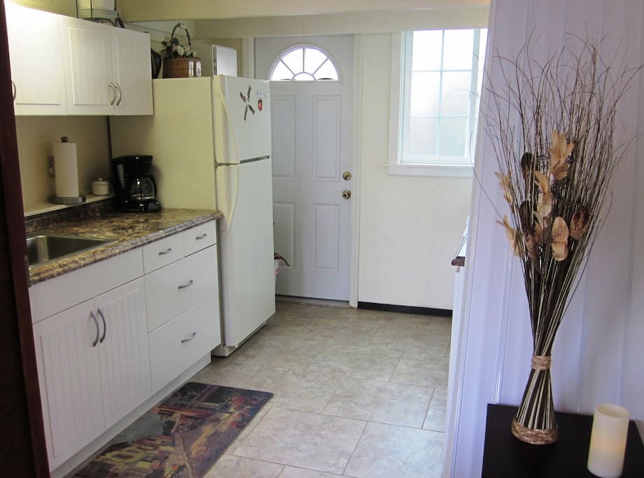 Well equipped kitchen includes dishes. cook ware, coffee pot & microwave.