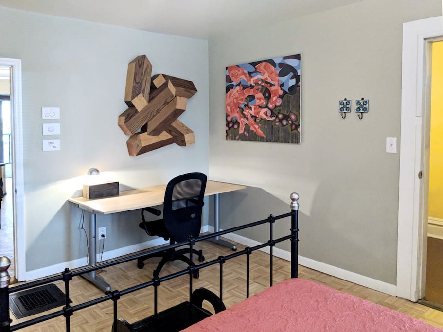 Spacious bedroom with work desk