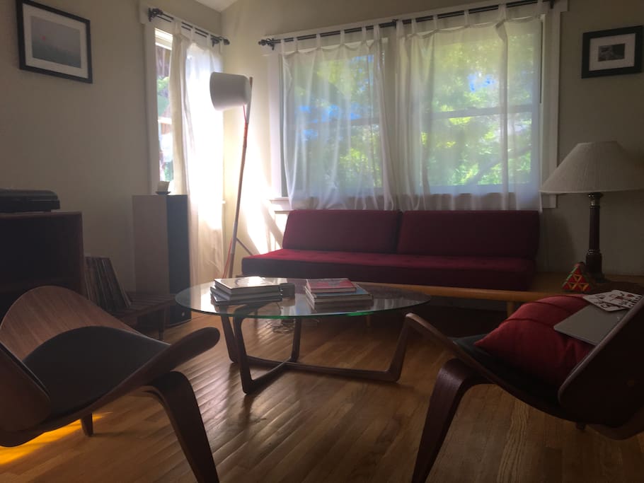 Spacious, sunlit living room.