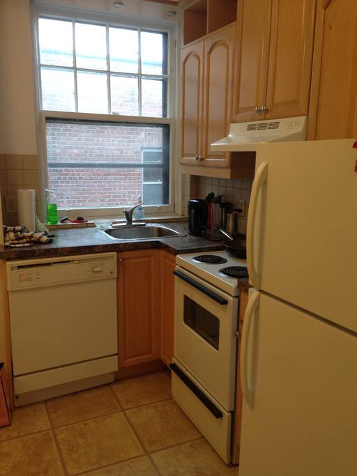 kitchen is fully stocked with all appliances