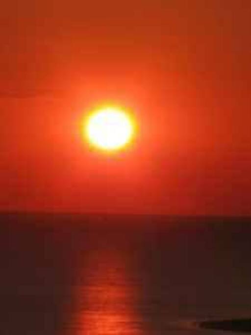 SUNSET VIEW FROM CONDO BALCONY