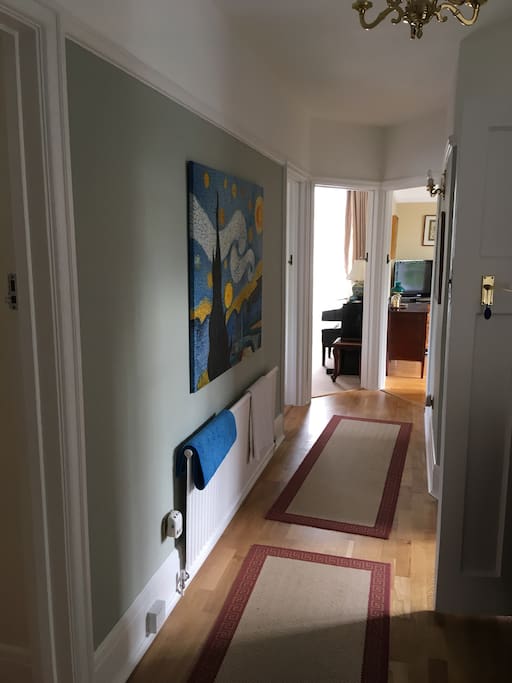 Hallway in the property. Bedroom to immediate left.