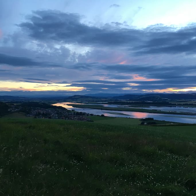 Guests are welcome to walk around the 650 acre farm. They can enjoy breathtaking 360 degree views over Perthshire, Angus and Fife. This photo shows the view up the River Tay towards Perth at sunset - a 15minute walk from The Arches but a ideal romantic spot for a proposal or drink!