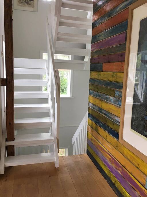 Upstairs is the master bedroom downstairs are three bedrooms and a bathroom