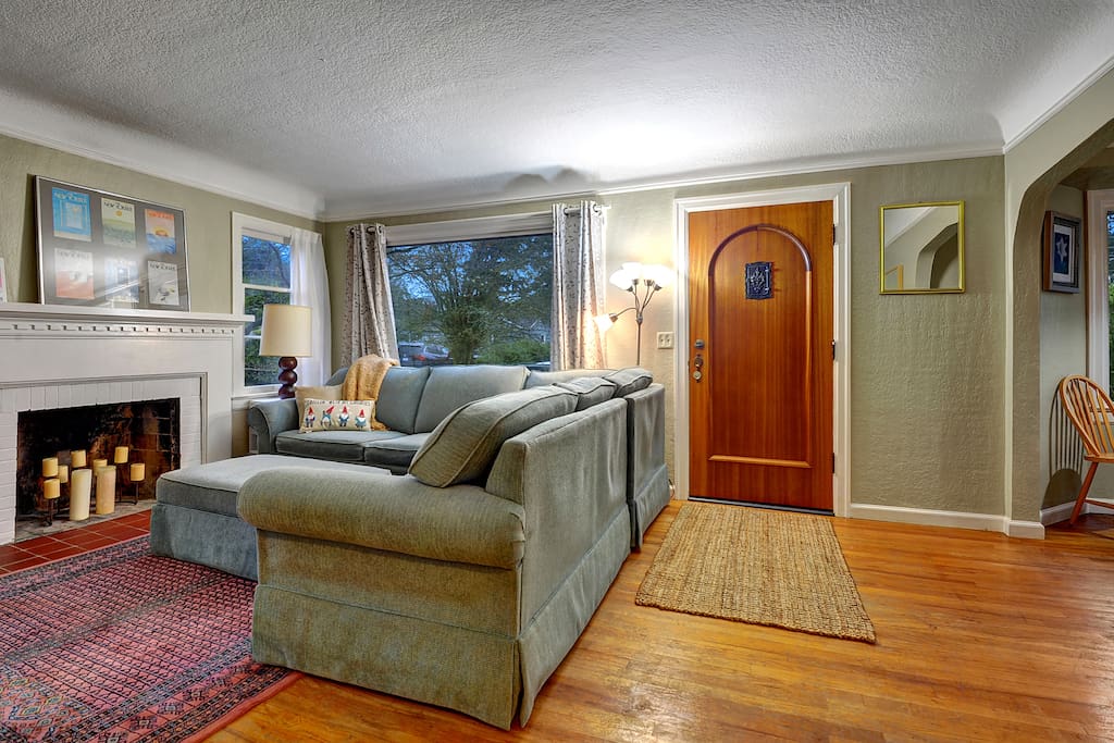 Living room with fireplace that is for candle use only.