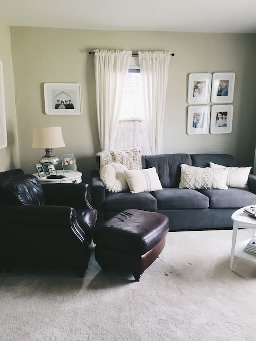 This is the cozy TV room. The brand new Crate and Barrel couch turns into a King size bed with a temperpedic mattress.