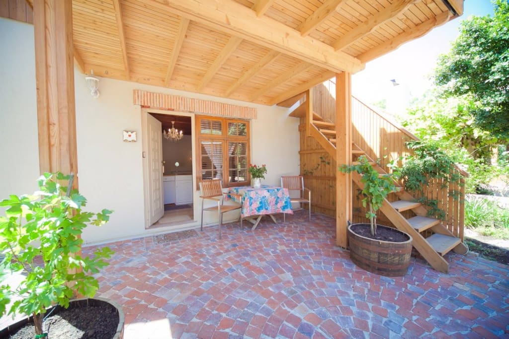 Cottage suite entrance with table outside