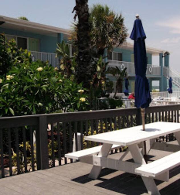 Around the pool there is table to seat or eat with family