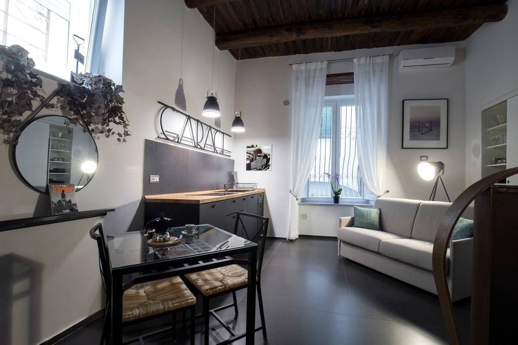 The Kitchenette, the Dining Table and the Sofabed * GiO' Studio * Barbuti Square #Starhost