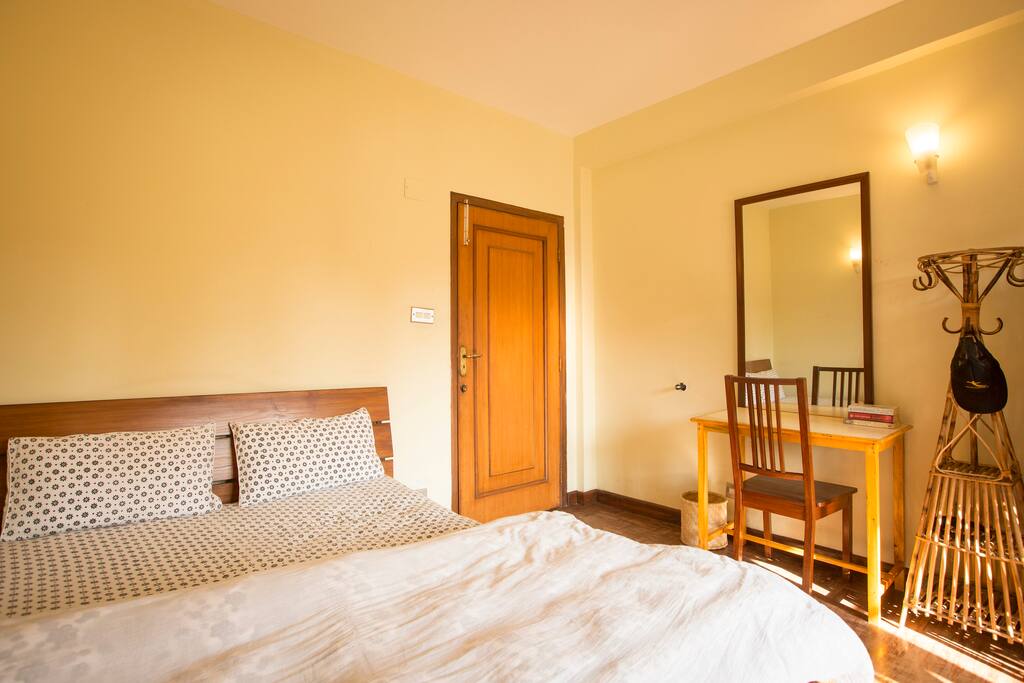 Your comfortable room with a queen bed.