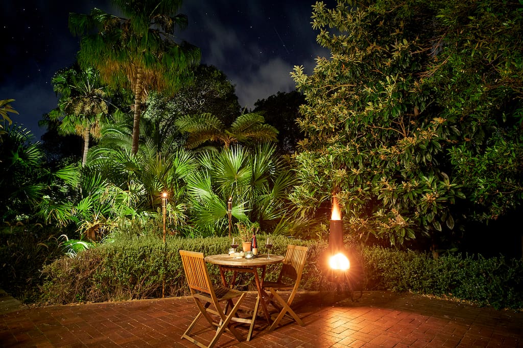 Private rear courtyard at night