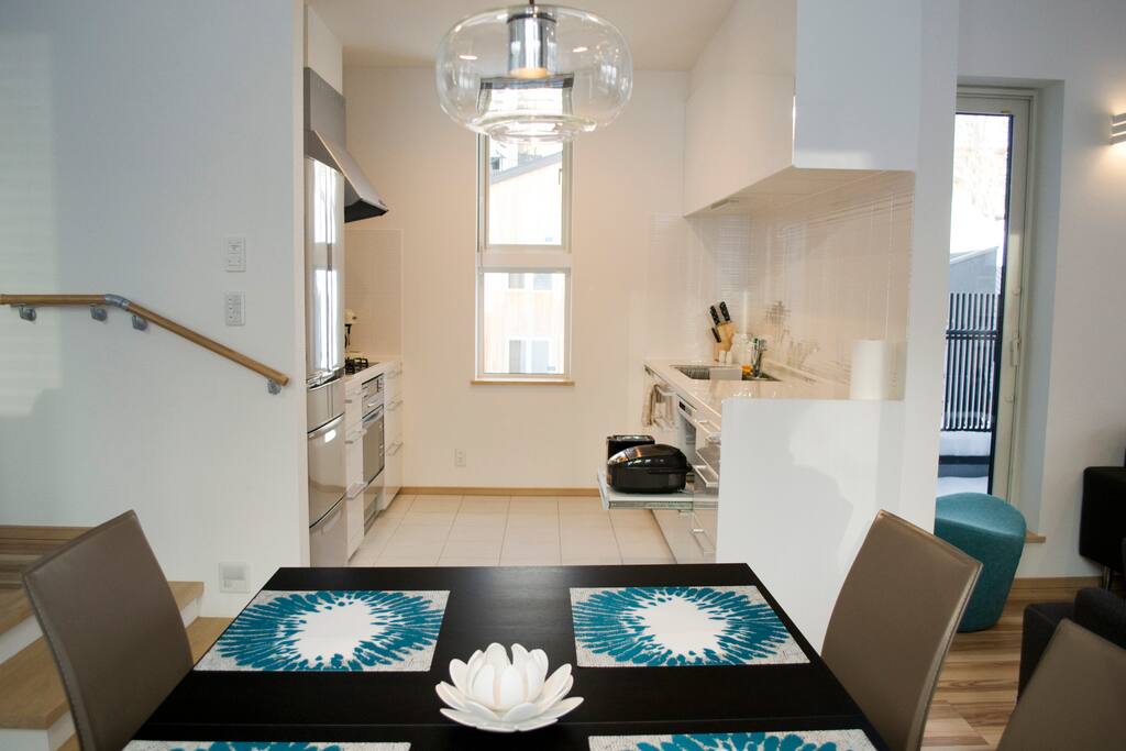 The dining and kitchen area; prepare a feast or sample some local take out