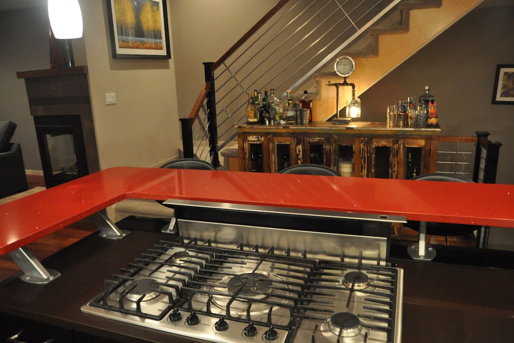 5 burner gas stove with exhaust fan that raises from countertop