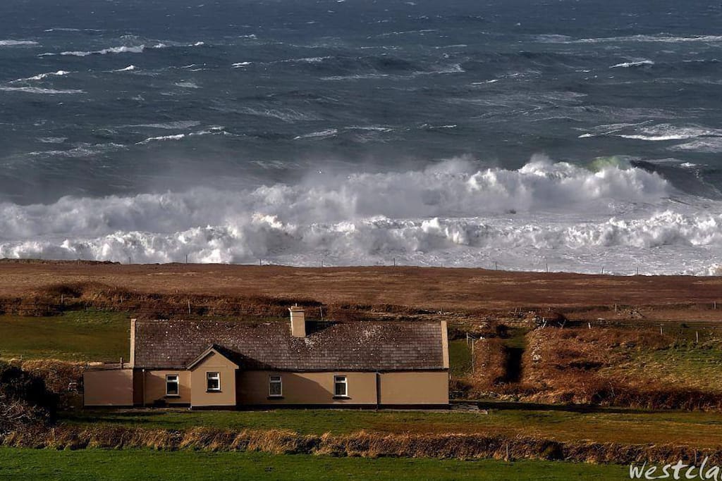 View of back of cottage and Atlantic Ocean