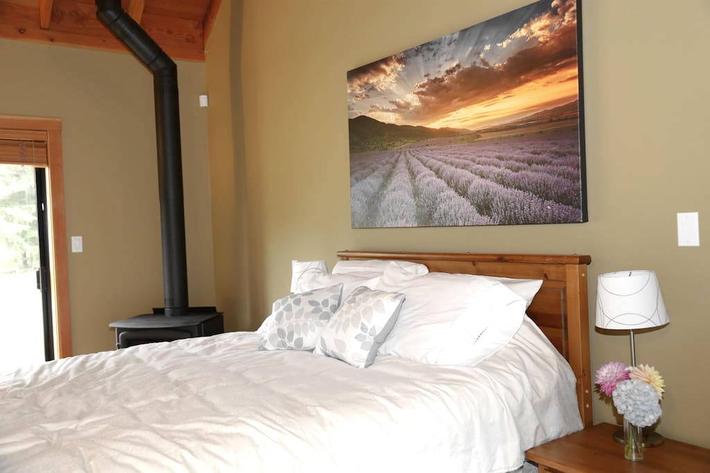 Comfortable Queen Bed with wood burning fireplace