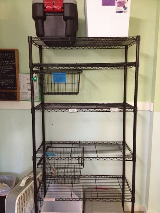 Guests in bottom bunks have access to 2 separate shelving units with shelves labeled "BOTTOM" for this guests to use.