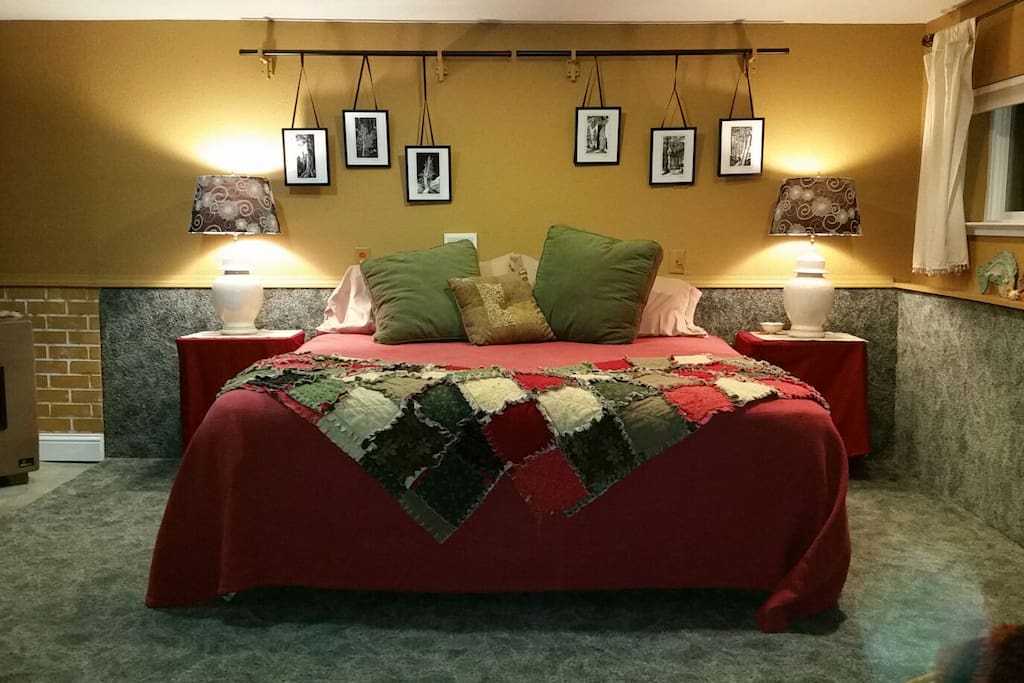 Bedroom - two twins made up as a king. Can be made up as two twins- whichever you prefer. A very large room, it also has a bar height table for 4, desk and papasan chair. This room also has its private 1/2 bath and has the doorway to the hot tub.