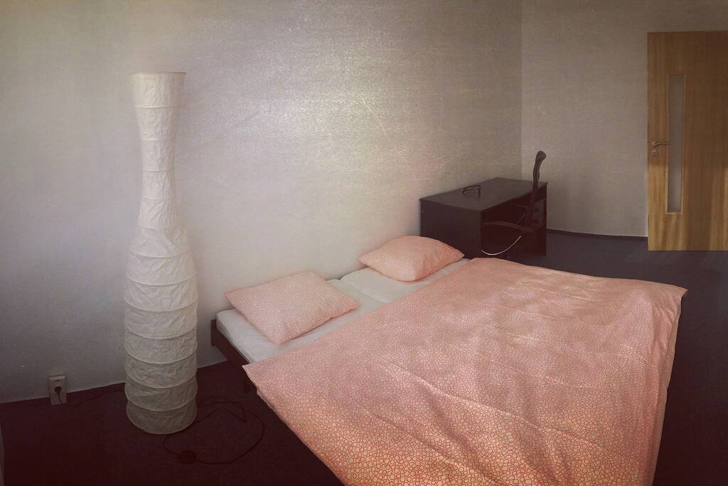 Cozy bed, and big working space.