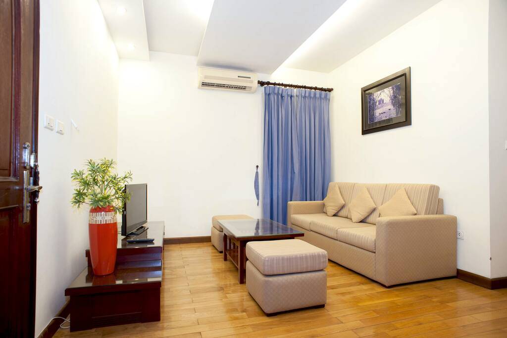 sofa corner with coffee table and TV