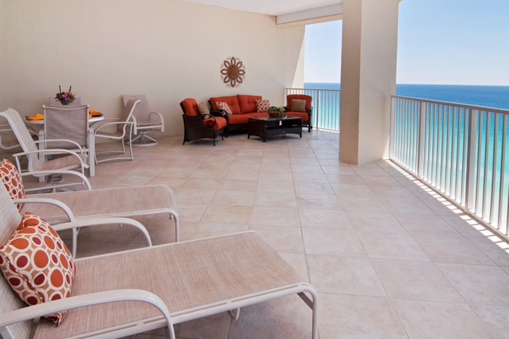 Enjoy the spacious 475 sq ft balcony w areas for dining, lounging or comfy seating
