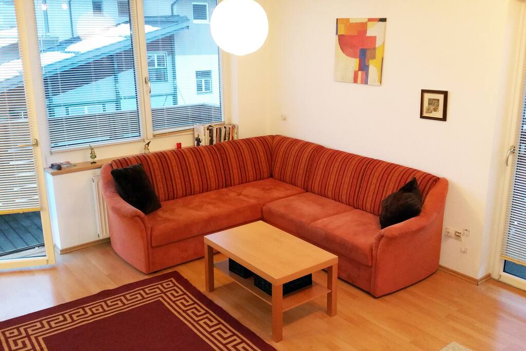 Open Plan Living Space
Corner sofa features comfortable double pull out bed with bedding included. Our coffee table has leaflets and brochures about the surrounding area for you to browse. The open place space is spacious and comforting with two balconies either side of the room with mountainous views.