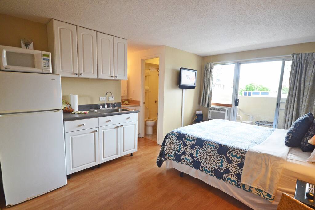 Kitchenette has a sink, refrigerator, microwave, coffee pot, tea kettle & a hot plate for lite cooking.