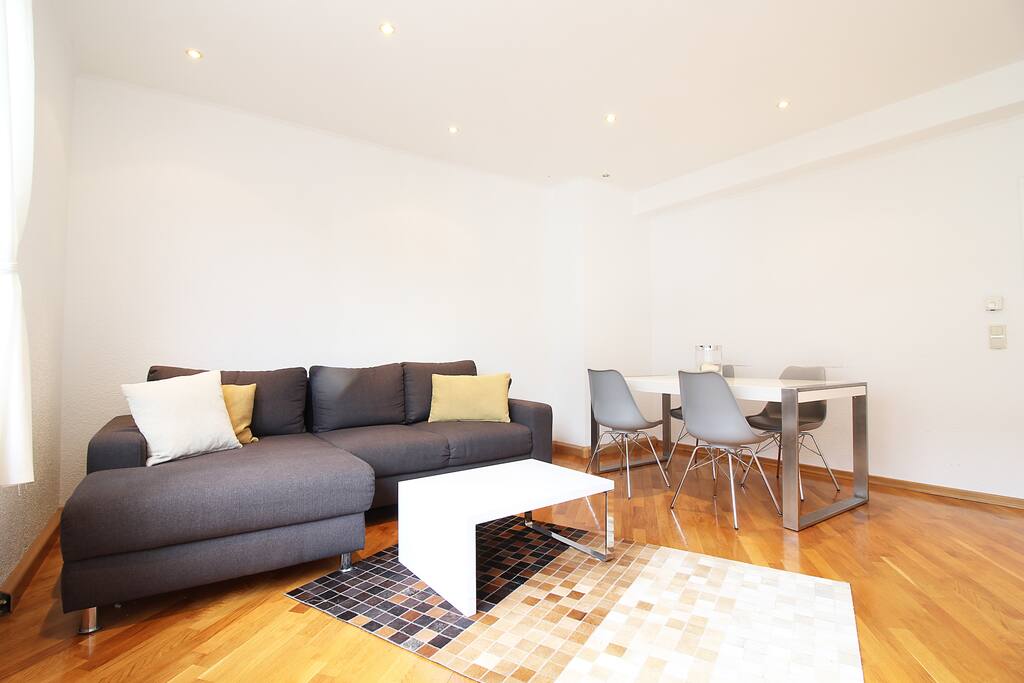 The big dining table for up to 4 persons suits perfectly for working with laptops or enjoying meals.