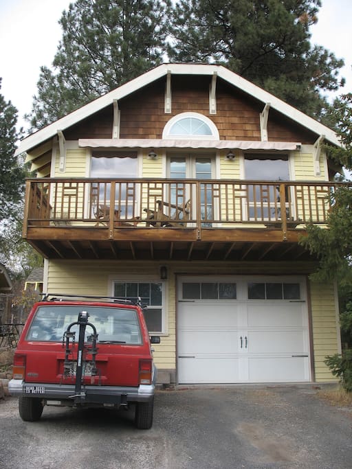 View from the street. The studio is a separate structure from the main house.