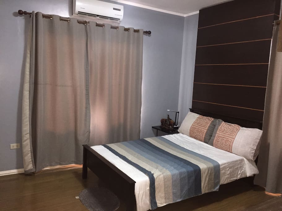 Couple bedroom with TV sets