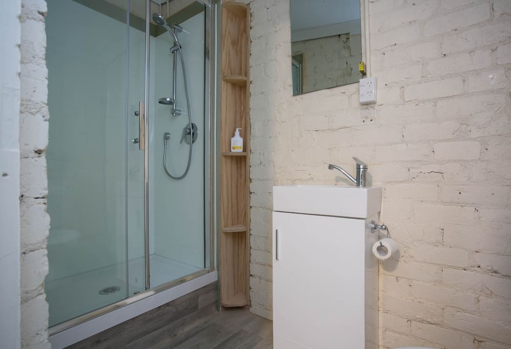 Bathroom with brand new shower