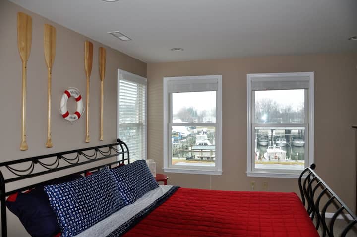 Welcome Aboard the Captain's Master Suite overlooking the marina and the Chesapeake Bay with wall-to-wall windows to enjoy the scenery.

Kentmorr Marina is right across the street; check out their website for charters and cruises.
