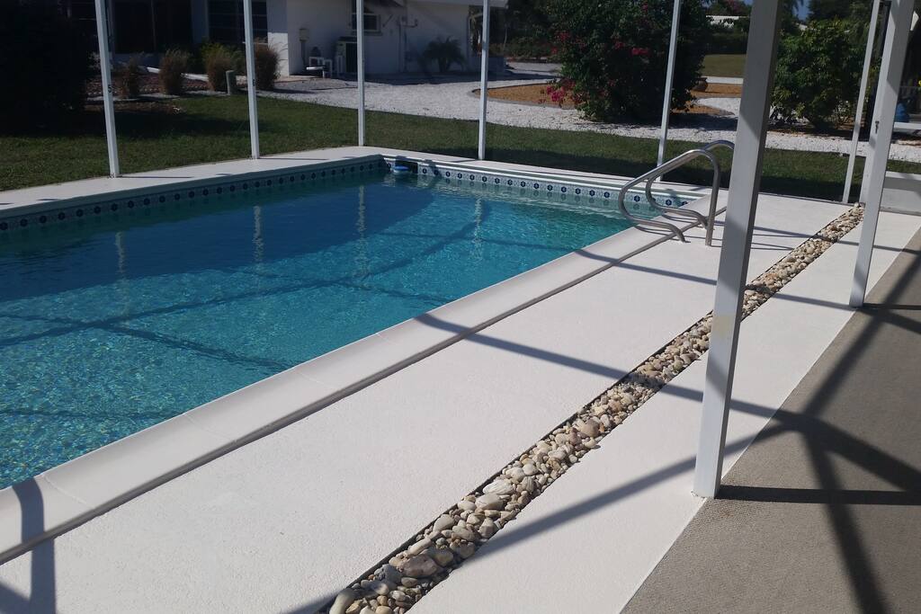 pool - heated if required with screened cage and lanai area