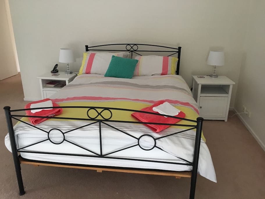 Very spacious main room with Queen Bed.