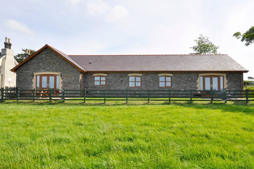 Front on the cottage with Patio area