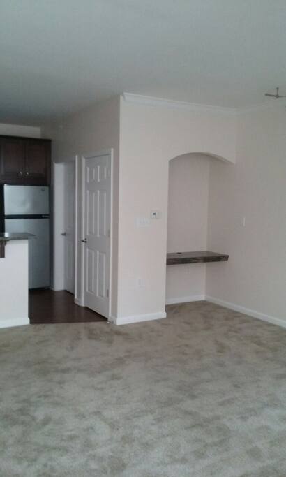There's a computer nook installed inside the living room.