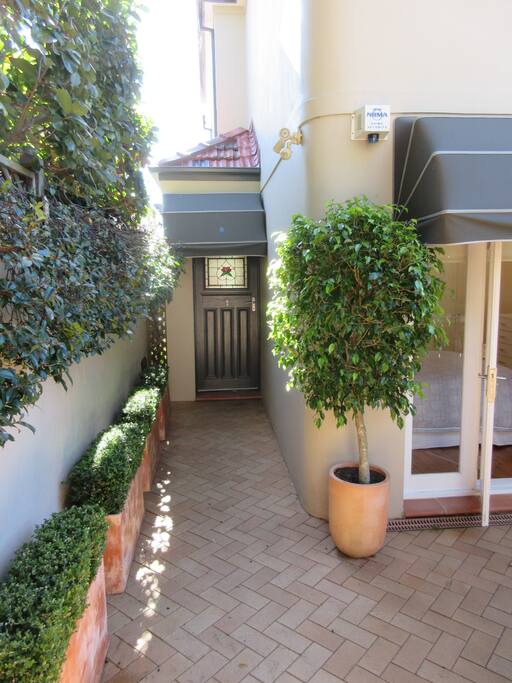 Entry via front courtyard