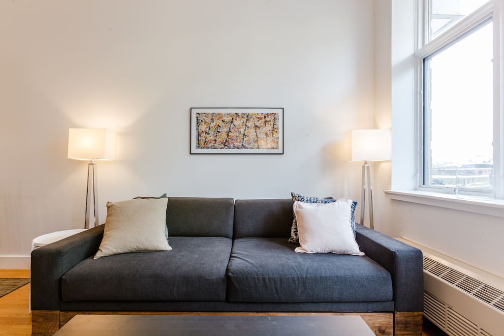 Relax after a long day touring the city in this oversized CB2 couch, that easily concerts to a sleeper sofa!