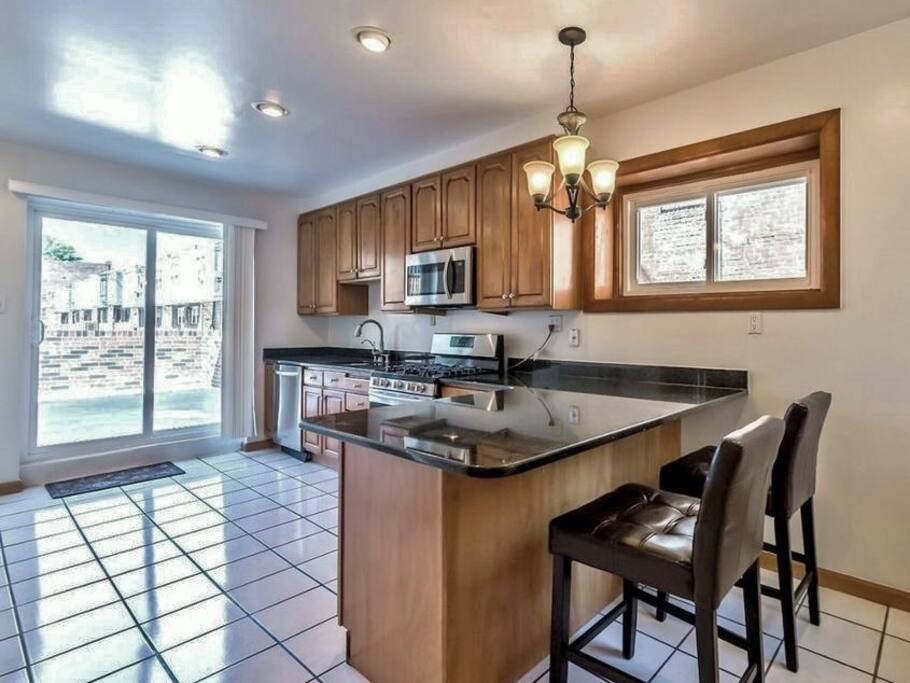 Kitchen opens out to spacious patio