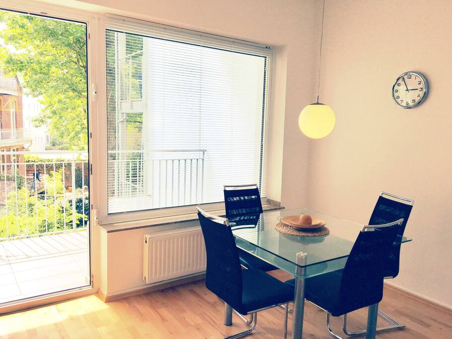 Bright dining room towards balcony