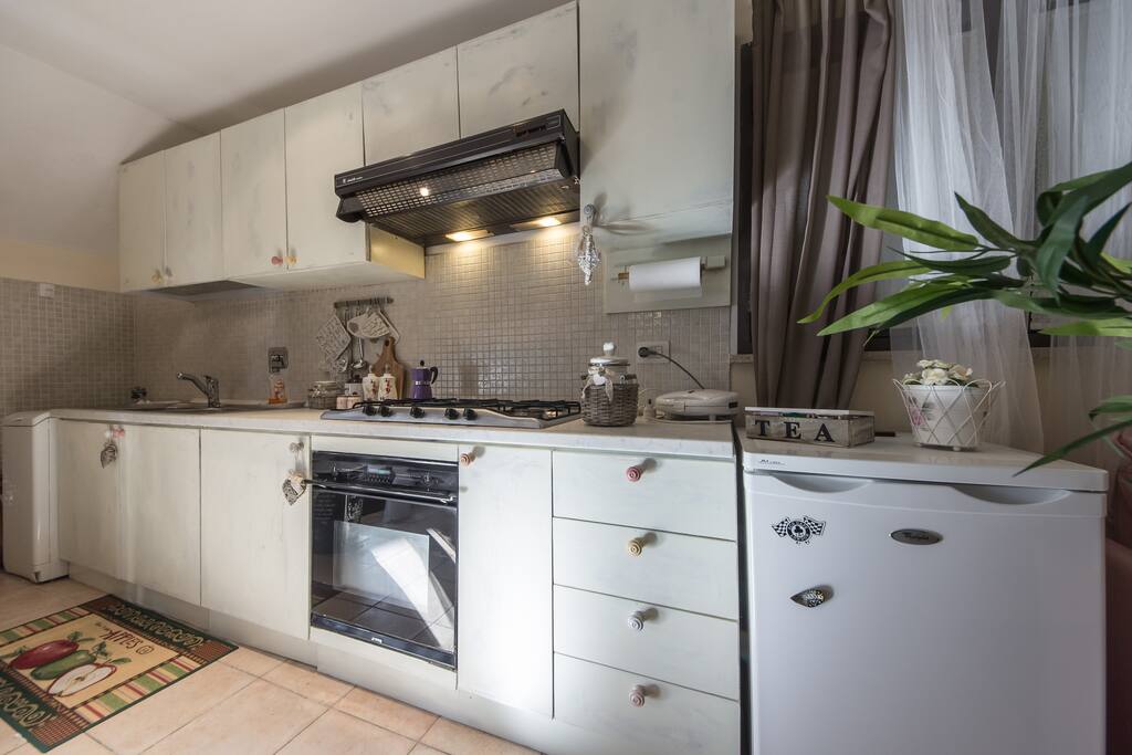 In the Kitchen there are Oven, Small Fridge, Freezer and all the stoves, cutleries and so on.. Washing Machine