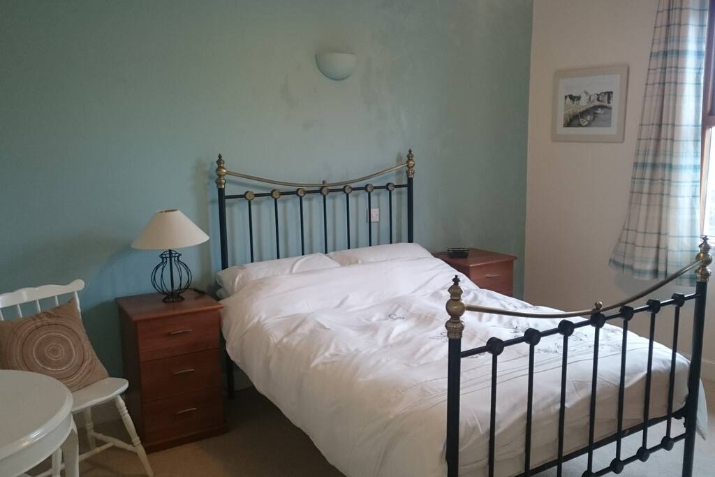 Comfortable double bedroom with wardrobe