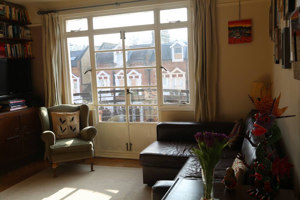 Our living room (the couch pulls out to make a full size bed for guests).