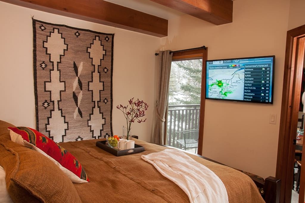 The master bedroom features a comfortable king or queen sized bed.